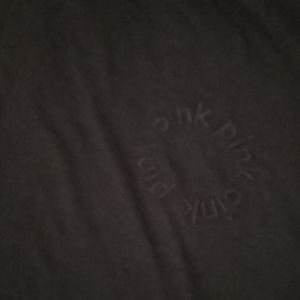 Black Pink shirt with pink logo on it
